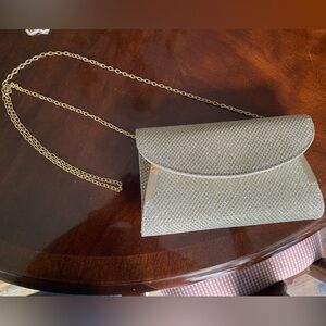 Like New Gianni Bini Gold 9”x5” Clutch purse with a gold removable chain